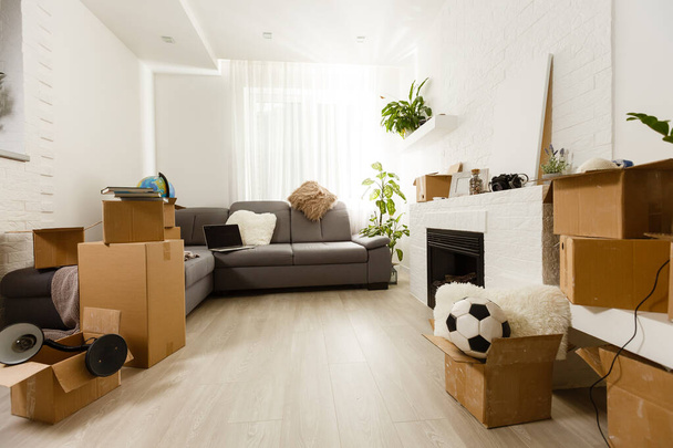 New home concept. Boxes in empty room. - Photo, Image