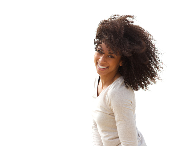 Beautiful young black woman smiling outdoors - Photo, Image
