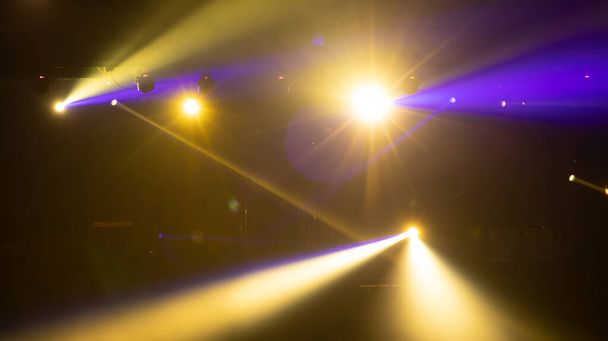 Empty stage concert with colorful lighting laser beam spotlight show in disco pub club bar background for party music dancing festival performance. Entertainment nightlife. Celebration event. - Photo, Image