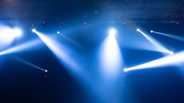 Empty stage concert with colorful lighting laser beam spotlight show in disco pub club bar background for party music dancing festival performance. Entertainment nightlife. Celebration event. - Photo, Image