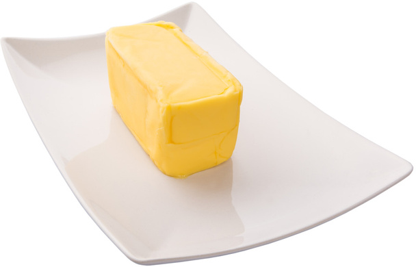 Mantequilla sobre fondo blanco
 - Foto, Imagen