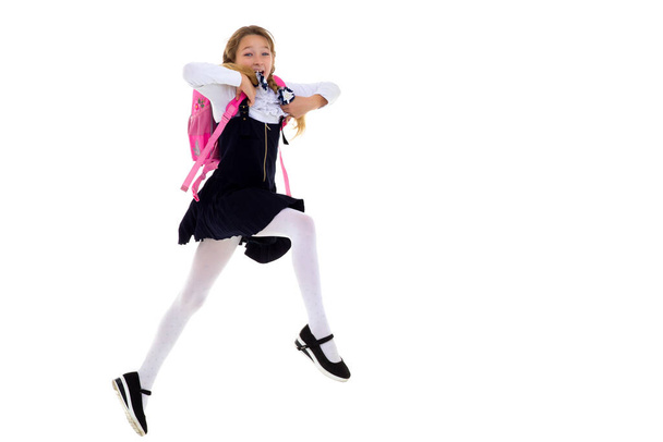 Happy schoolgirl running with backpack - Fotografie, Obrázek
