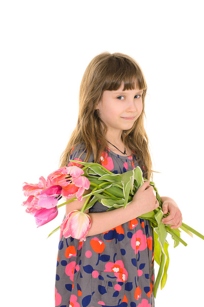 Pretty girl with flowers for mom - Photo, Image