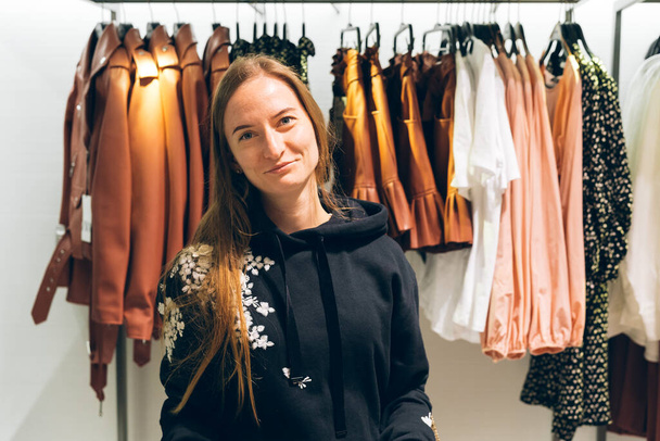 Smiling young woman portrait shopping trendy clothes - Fotoğraf, Görsel