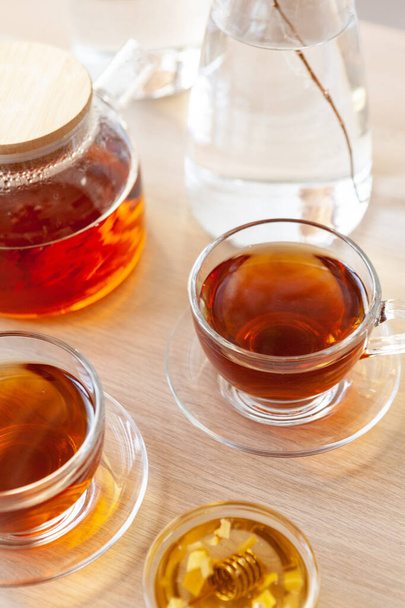 Close up of glass tea cup with honey - Foto, Imagem