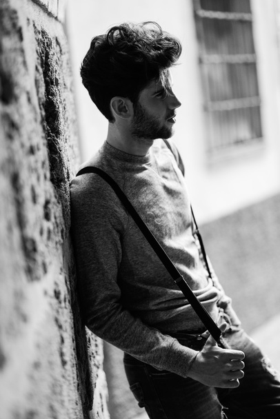 Man wearing suspenders in urban background - Zdjęcie, obraz