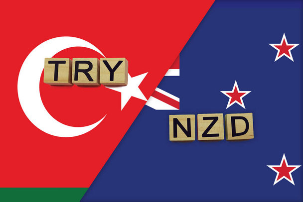 Törökország és Új-Zéland valuta kódok nemzeti zászlók háttér. Nemzetközi pénzátutalási koncepció - Fotó, kép