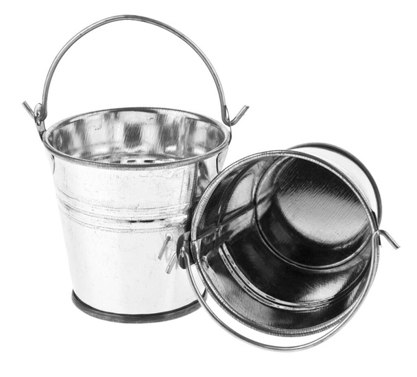 Metal buckets isolated on a white background close-up. - Photo, Image