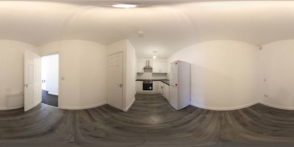 360 Degree сферическая панорама сфера фото совершенно новой типичной британской кухни в квартире показывая холодильник, раковина и стиральная машина - Фото, изображение