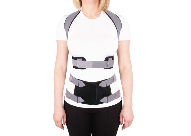 Orthopedic lumbar corset on the human body. Back brace, waist support belt for back. Posture Corrector For Back Clavicle Spine. Post-operative Hernia Pregnant and Postnatal Lumbar brace after surgery. - Photo, image