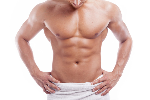 Muscular man in towel - Фото, изображение