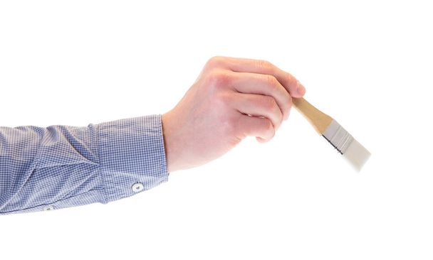hand holding a brush isolated on white background - Photo, Image