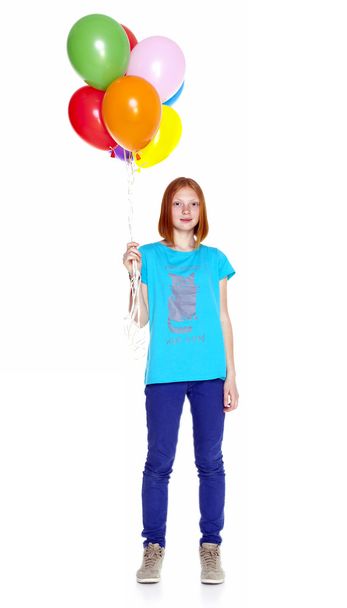 Girl with inflatable balloons isolated on white background - Photo, Image