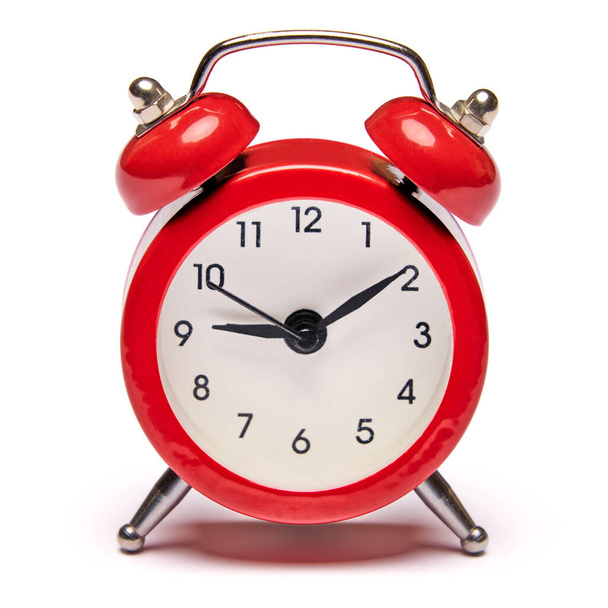 Red vintage alarm clock isolated on white background with clipping path - Foto, Imagem