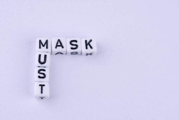 Letters with the word Mask Must - Foto, imagen