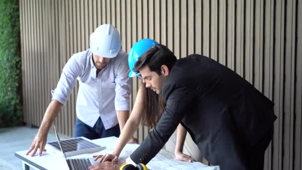 Engineer, architect and business man working on the engineering project. Group of young business people working together in the office. - Footage, Video