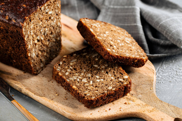 Sliced rye whole grain bread with seeds - Фото, зображення