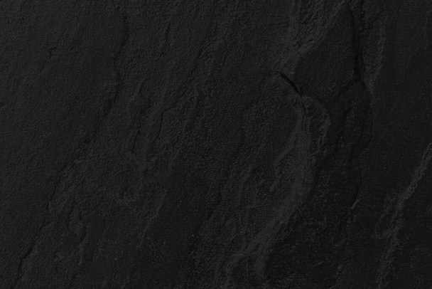 Donkergrijze zwarte leisteen achtergrond of textuur. Zwarte granieten platen achtergrond - Foto, afbeelding