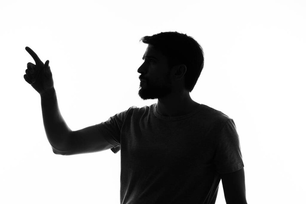sziluett férfi portré közelkép vágott kilátás fehér háttér - Fotó, kép