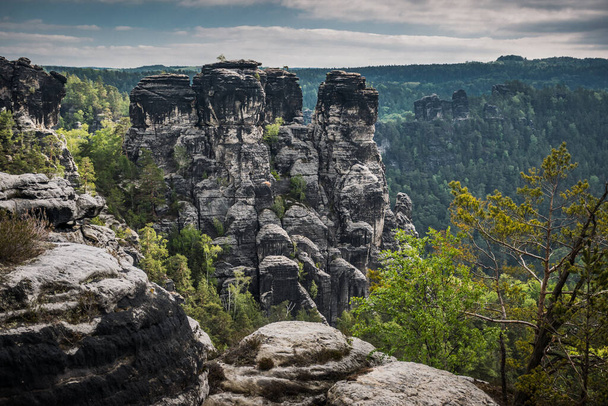 The Bastei is a rock formation towering above the Elbe River in the Elbe Sandstone Mountains of Germany. - Фото, изображение