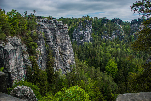 The Bastei is a rock formation towering above the Elbe River in the Elbe Sandstone Mountains of Germany. - Photo, image