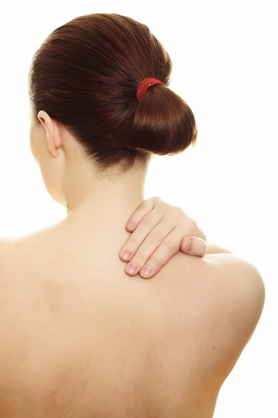 Woman massaging pain back isolated on white background - Photo, Image