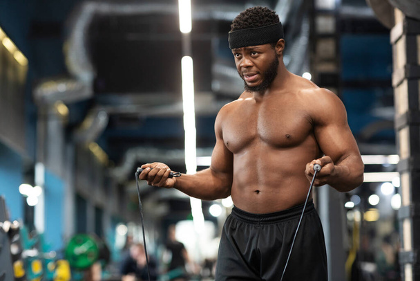 Hot african american young man bodybuilder warming up - Fotoğraf, Görsel