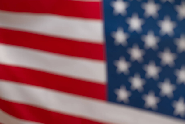 Αμερικανική σημαία ως φόντο. Θολή φόντο.  - Φωτογραφία, εικόνα