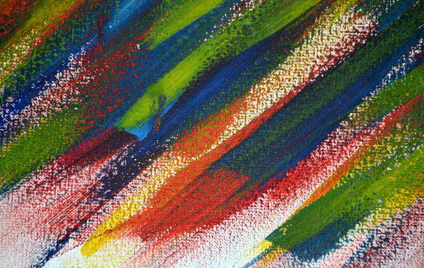 Background from different strokes of red, yellow, green and blue paint with brush on white background close-up. Bright colorful backdrop of brush lines. Mixing color streaks of paint on white canvas - Photo, Image