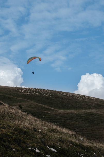 Flying on a paraglider.  View of the Monte Baldo mountain, Italy, from a height. - Фото, зображення