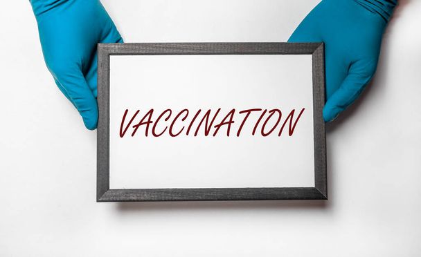 Vaccination word, inscription. Medical research concept and healthcare - Foto, afbeelding