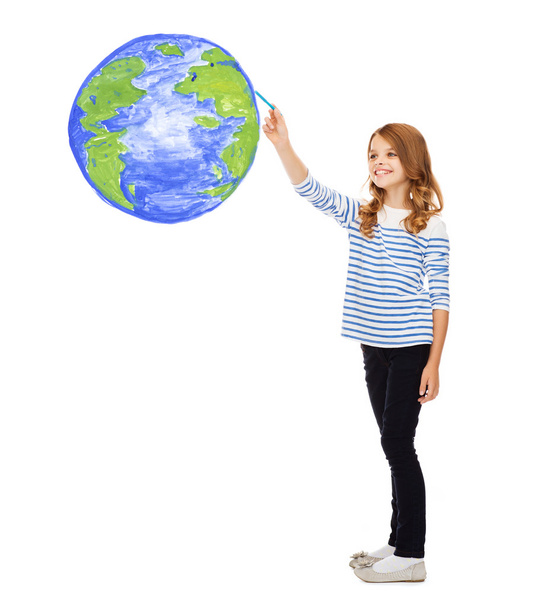 Girl drawing planet earth in the air - Foto, Bild