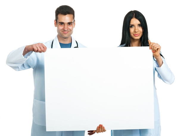 doctors with a board  - Foto, afbeelding