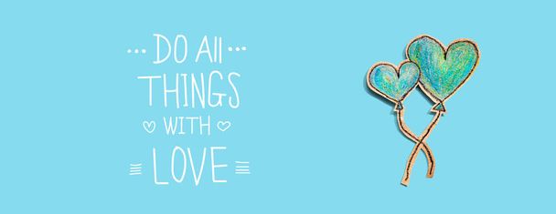 Do all things with love message with hand draw blue hearts - Foto, Bild