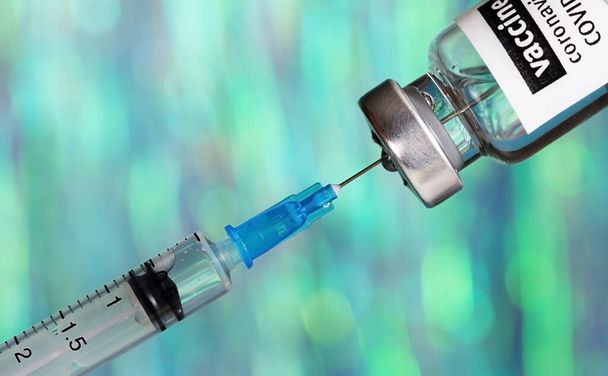 Coronavirus 2019-nCoV vaccine with syringe close up, medical concept, vaccination, injection,Disease prevention, immunization. - Fotografie, Obrázek