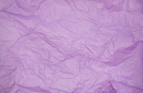 lila színű gyűrött papír szövet háttér textúra. ráncos szövet papír textúra - Fotó, kép