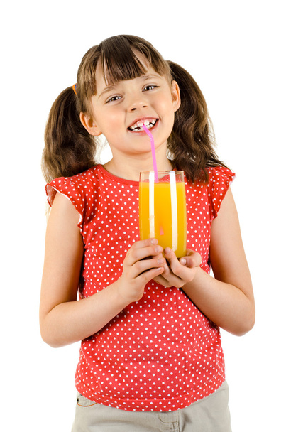 Little girl with multifruit juic - 写真・画像