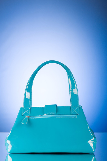 μπλε τσάντα το πολύχρωμο κλίση φόντο - Φωτογραφία, εικόνα