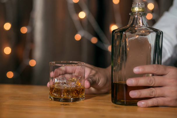 Barman pouring whiskey whiskey glass beautiful night - Photo, Image