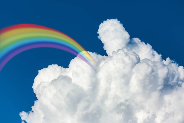 Beautiful view of blue sky with clouds and rainbow - Photo, Image