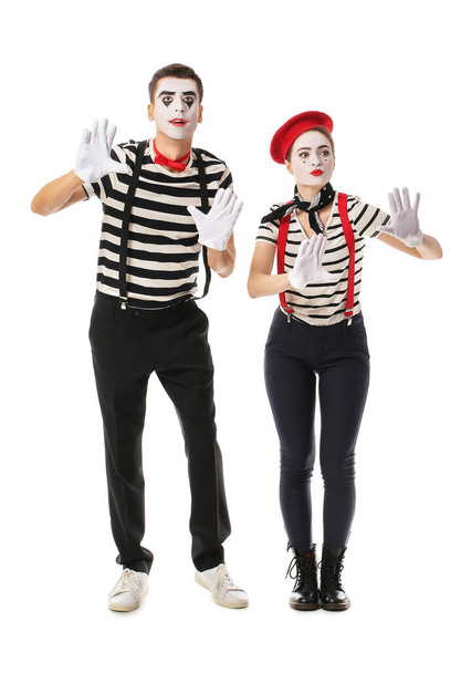 masculino e feminino pantomimistas no fundo branco - Foto, Imagem