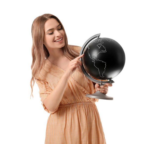 Turista femenina con globo sobre fondo blanco - Foto, Imagen