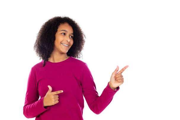 Teenager girl with afro hair wearing pink sweater isolated on a white background - 写真・画像