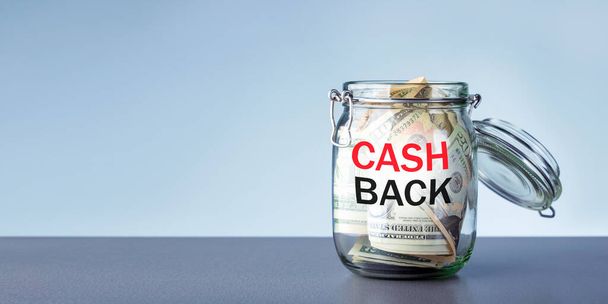 Glass jar with dollars and word CASH BACK. Banner. - Foto, Imagem