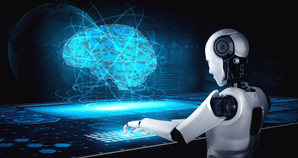 Robot humanoïde gebruik laptop en zitten aan tafel in concept van AI denken hersenen - Foto, afbeelding