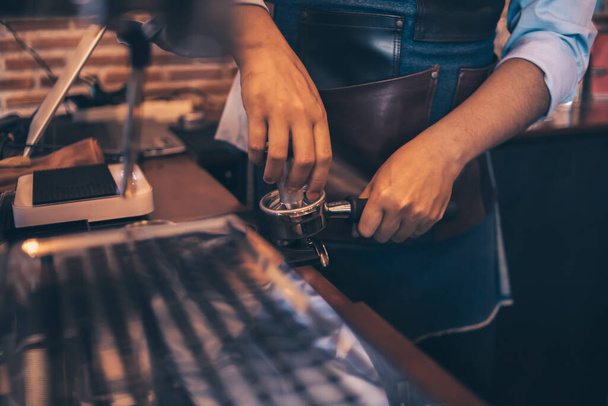 Barista cafe making coffee with coffee machine. Coffee preparation service concept. - Фото, изображение