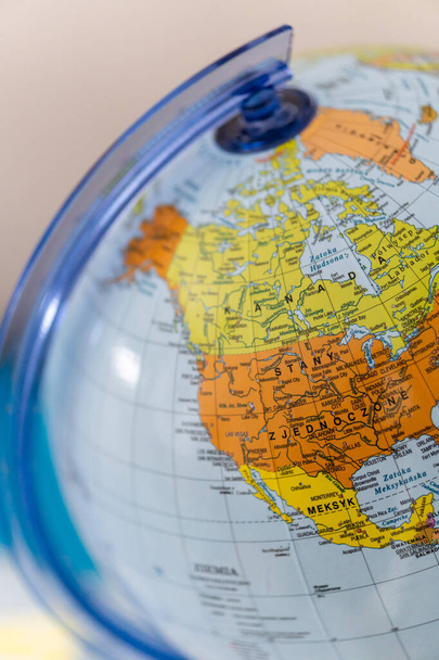 A vertical closeup shot of rotary world globe model - Foto, Imagem