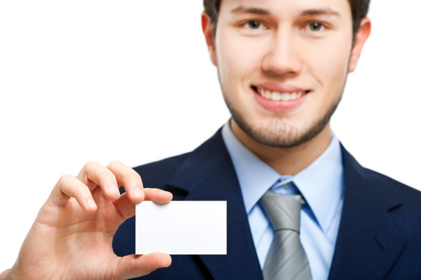 Business man holding a blank business card - Zdjęcie, obraz
