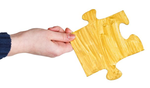 női kézzel festett sárga puzzle darab - Fotó, kép
