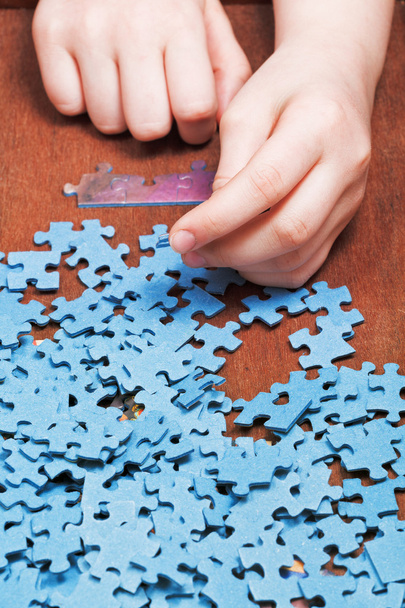 assembling of jigsaw puzzles - Photo, Image